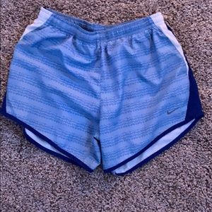 Patterned Blue Nike shorts.